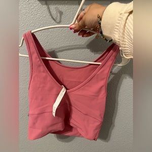 Pink power pivot rib tank *reversible* size 8 but can fit 6. Message b4 buying!